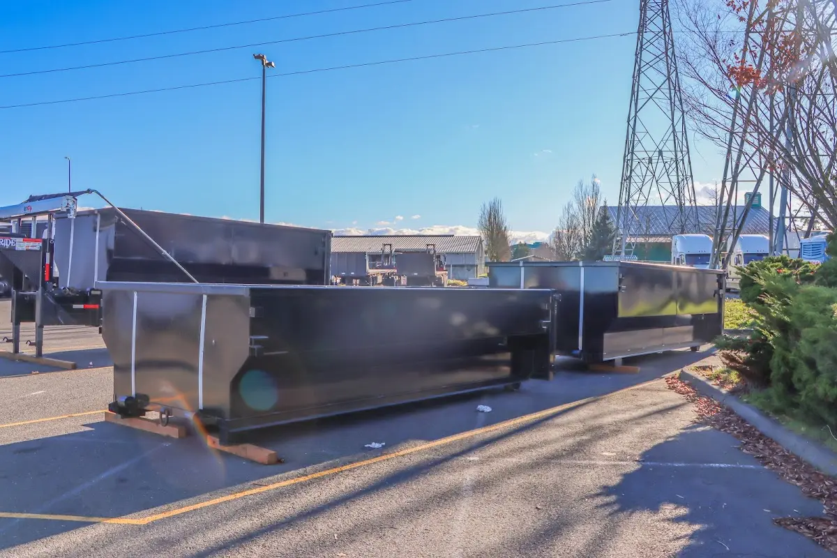Roll-off dumpster ready for waste disposal at job site for 2 Yard Dumpster Rental in Fort Oglethorpe